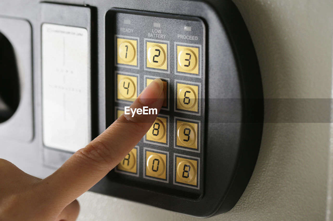 Cropped hand using intercom