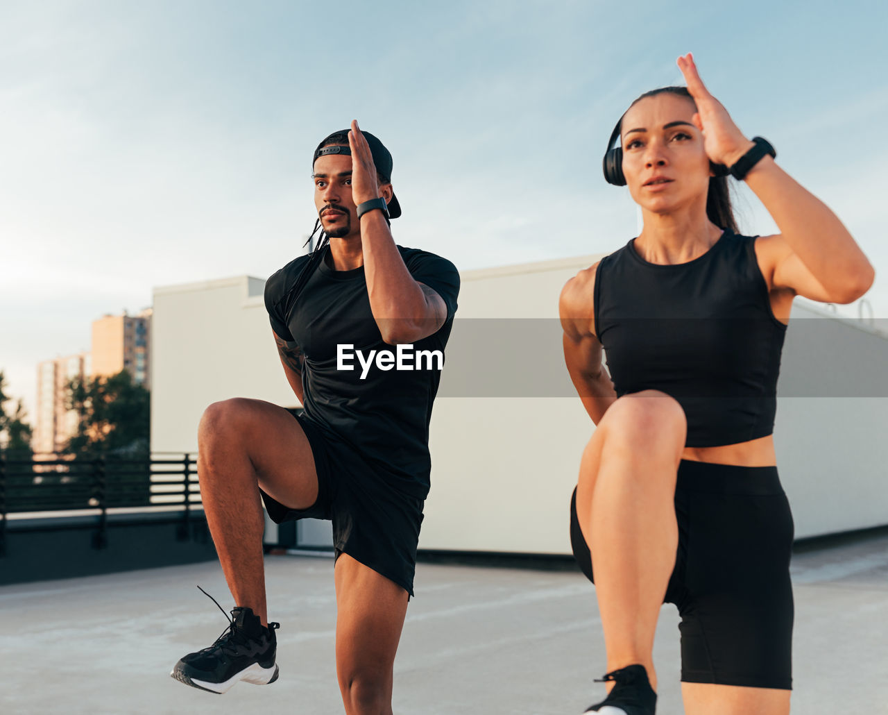 portrait of young woman exercising at gym