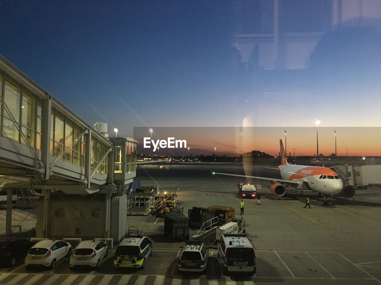 VIEW OF AIRPORT RUNWAY AGAINST CLEAR SKY