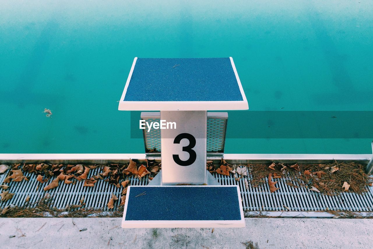 Number 3 diving board at swimming pool