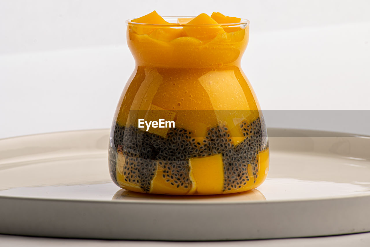 Mango pudding with chia seeds or basil seeds