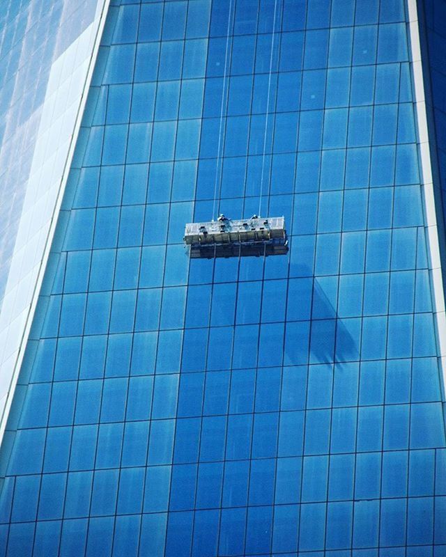 LOW ANGLE VIEW OF MODERN BUILDINGS