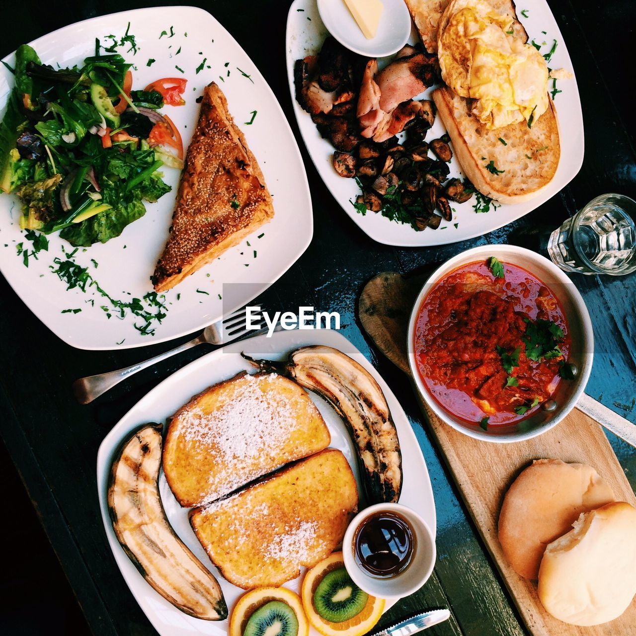 High angle view of food served in plates on table