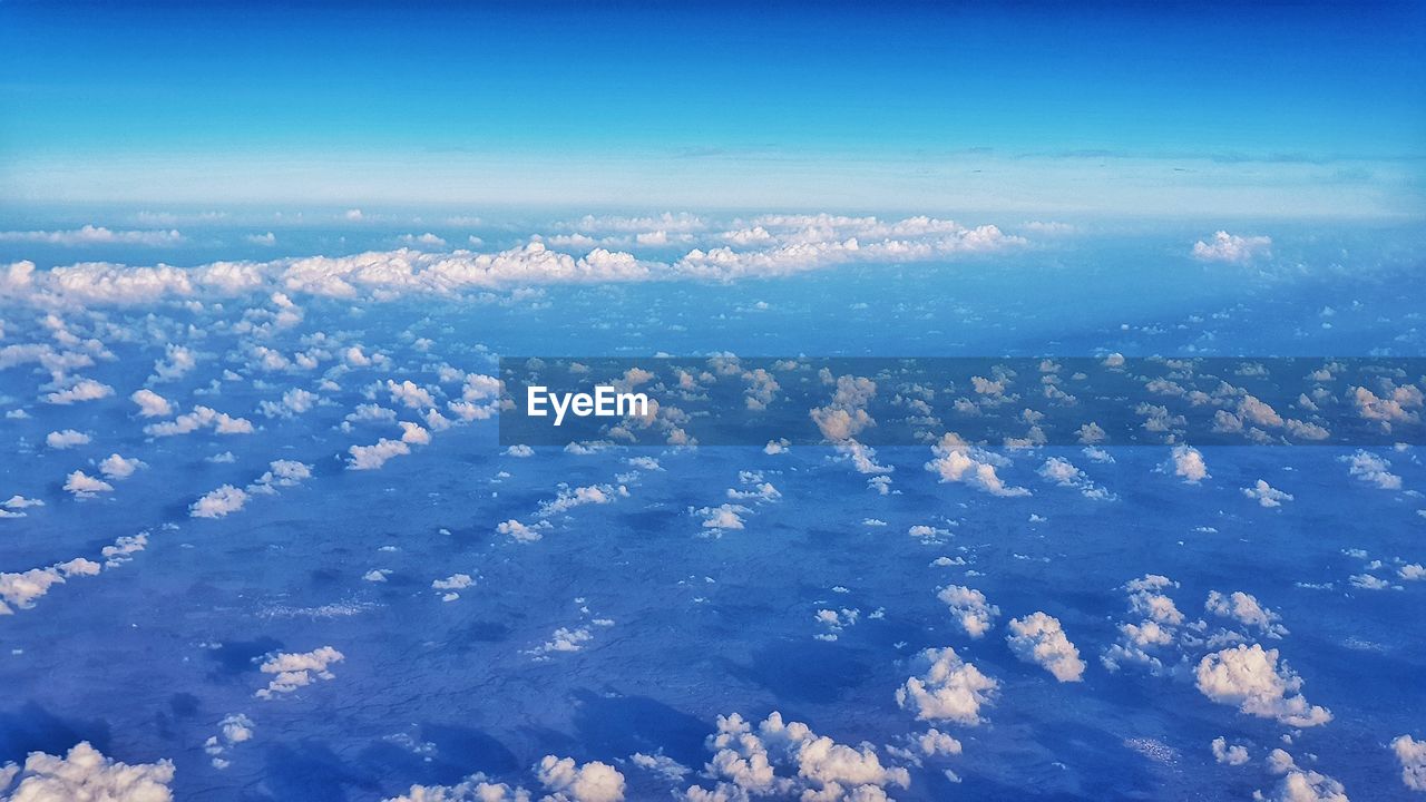 AERIAL VIEW OF CLOUDSCAPE OVER SEA