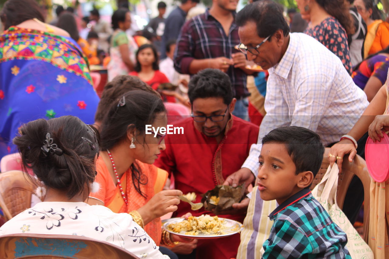 Family having food during celebration