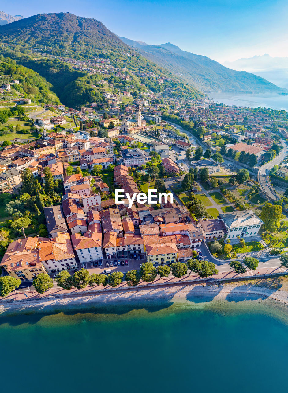 SCENIC VIEW OF RIVER BY BUILDING AGAINST SKY