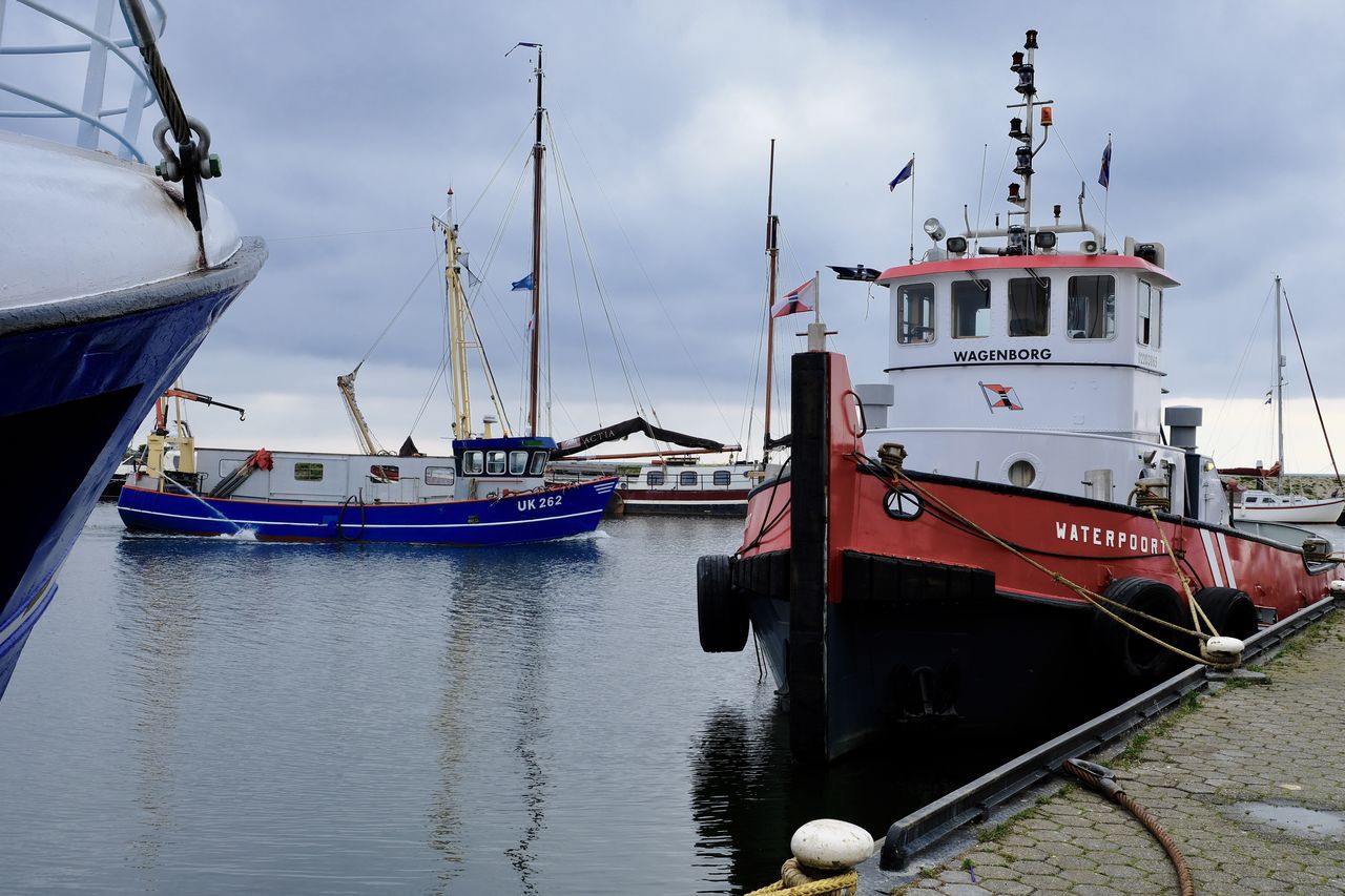 SHIP MOORED AT HARBOR