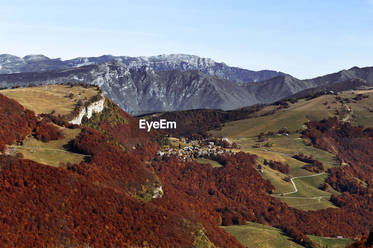 Sudtirol malga hiking trail in autumn foliage, trentino, italy, trento