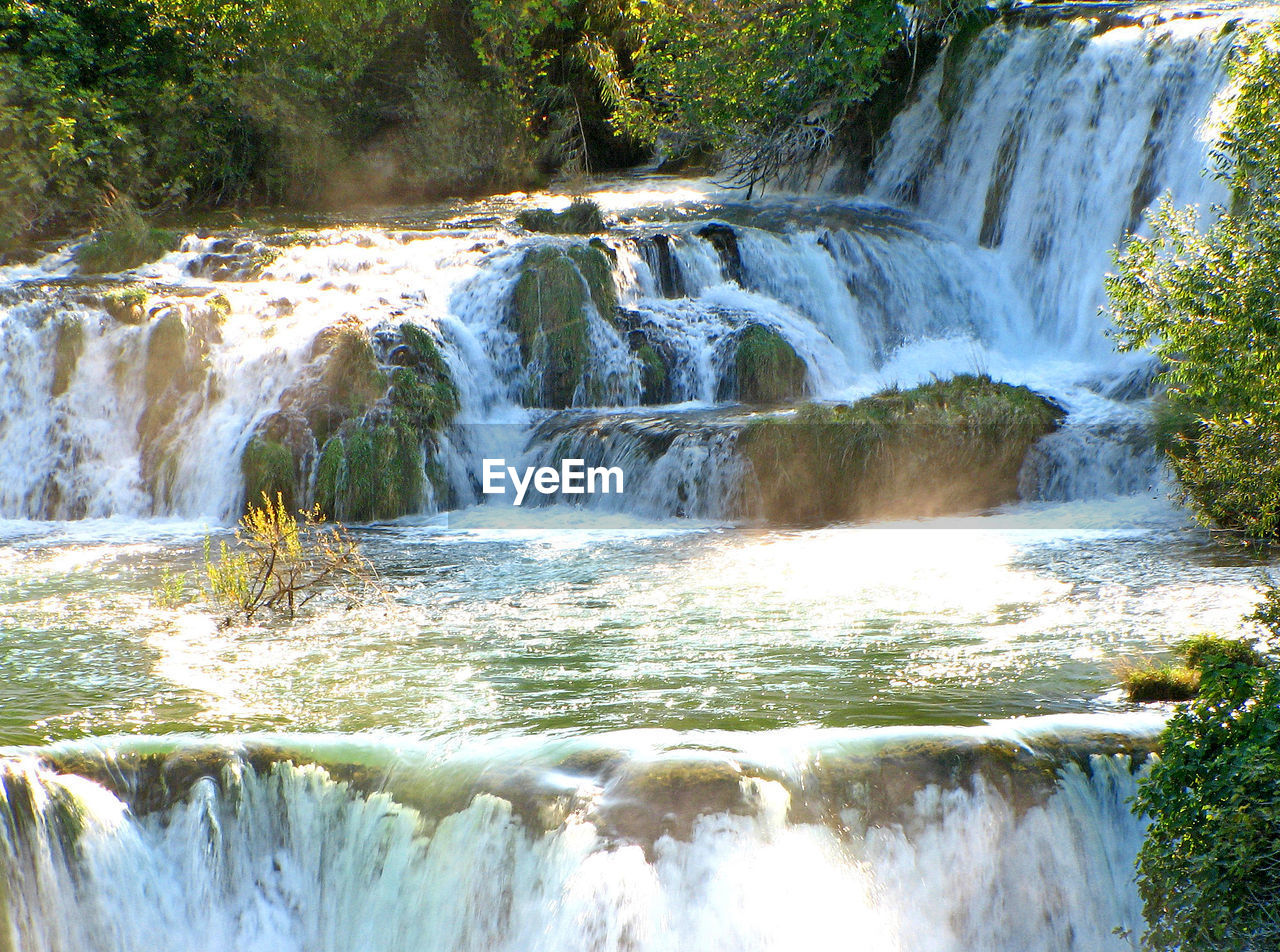 SCENIC VIEW OF WATERFALL