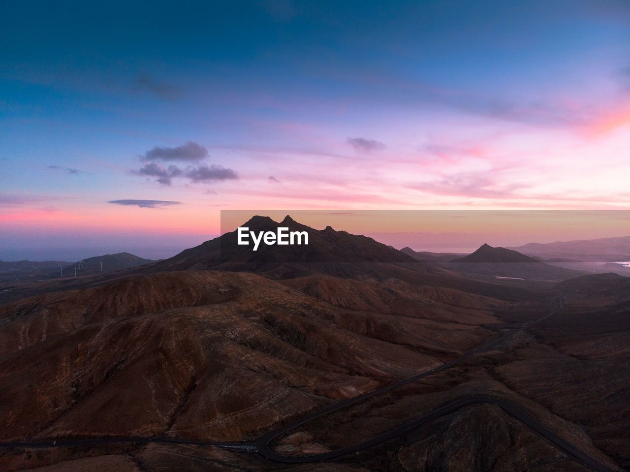 Scenic view of mountains during sunset