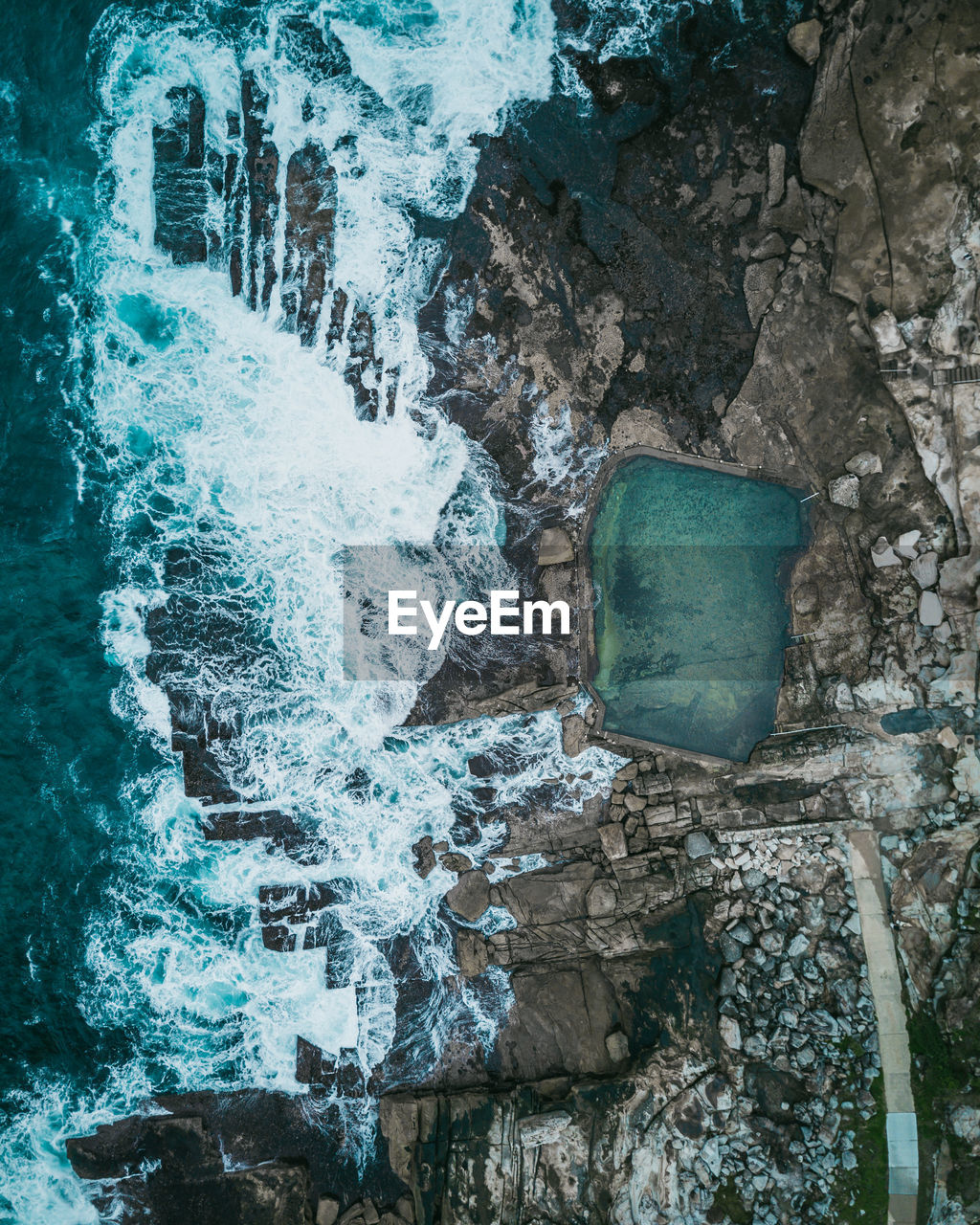 Aerial view on waterfall on rocks