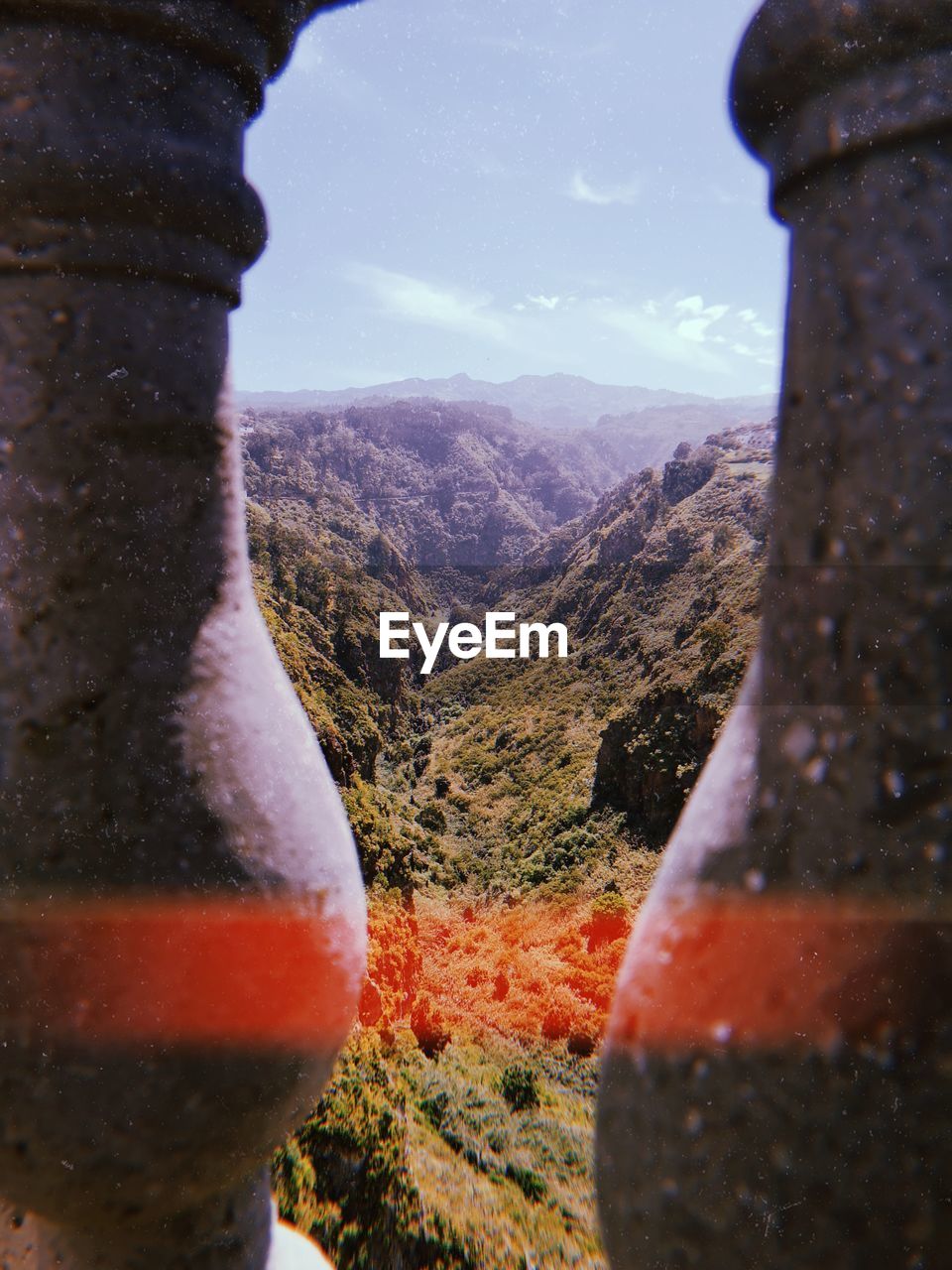 CLOSE-UP OF BEER GLASS ON MOUNTAIN