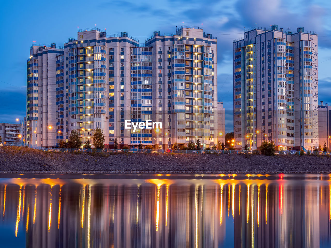 Illuminated buildings in city at night