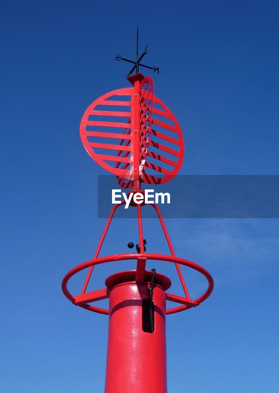 Red weather vane on navigation bouy blakeney quay norfolk