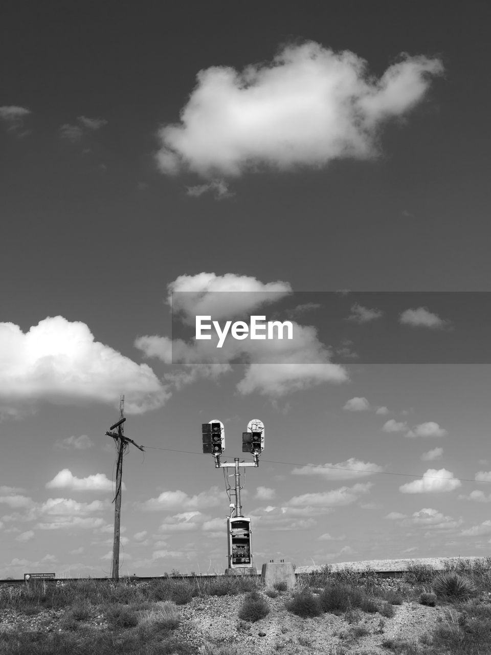 LOW ANGLE VIEW OF LANDSCAPE AGAINST CLOUDY SKY