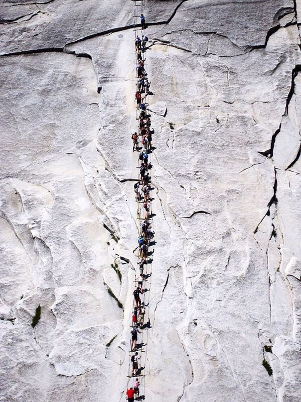 People climbing on rocky mountains