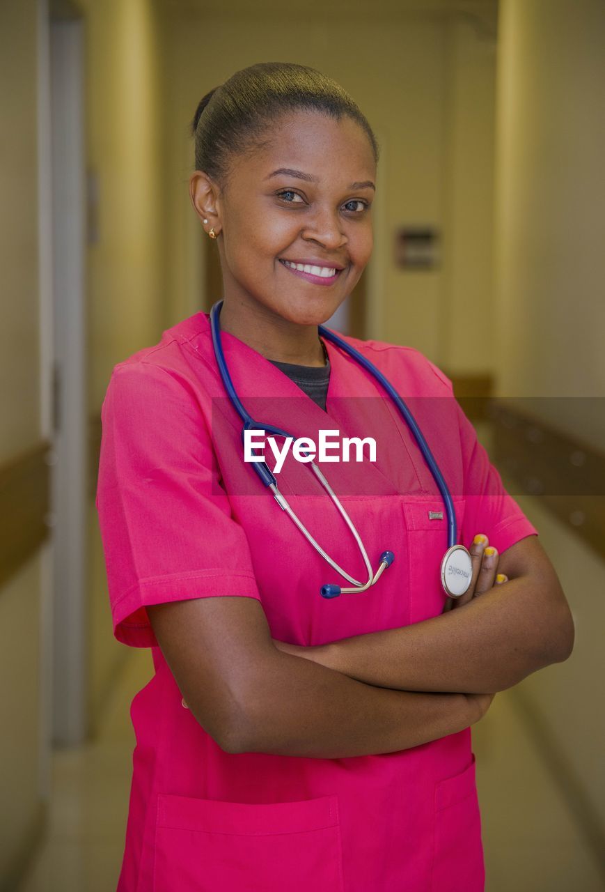 Portrait of a smiling young nurse with a stethoscope 