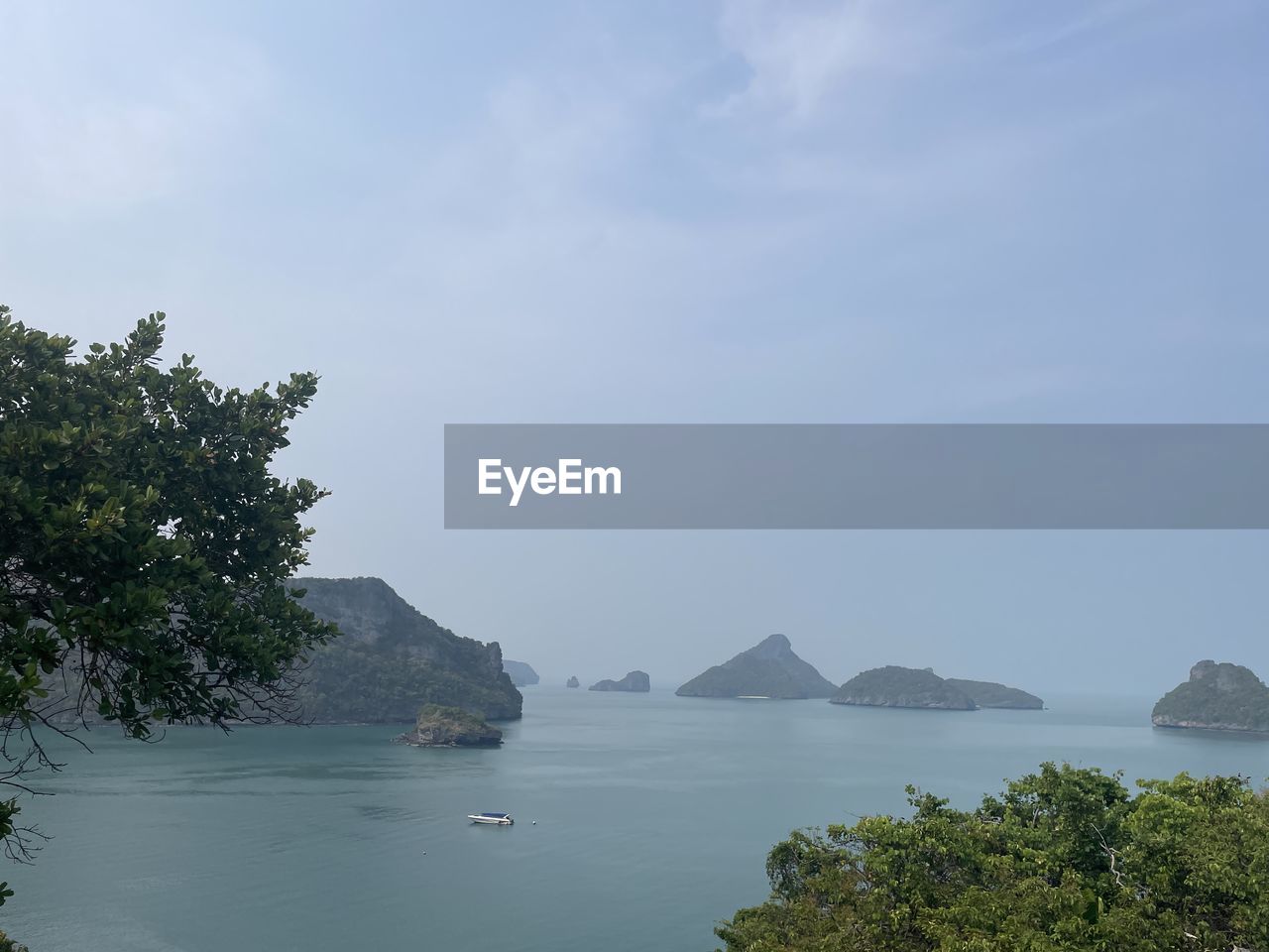 scenic view of sea against blue sky