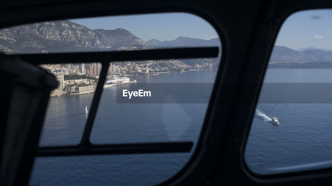 VIEW OF SEA THROUGH WINDOW