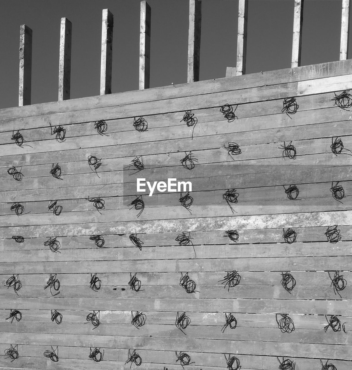 CLOSE-UP OF TEXT ON METAL WALL