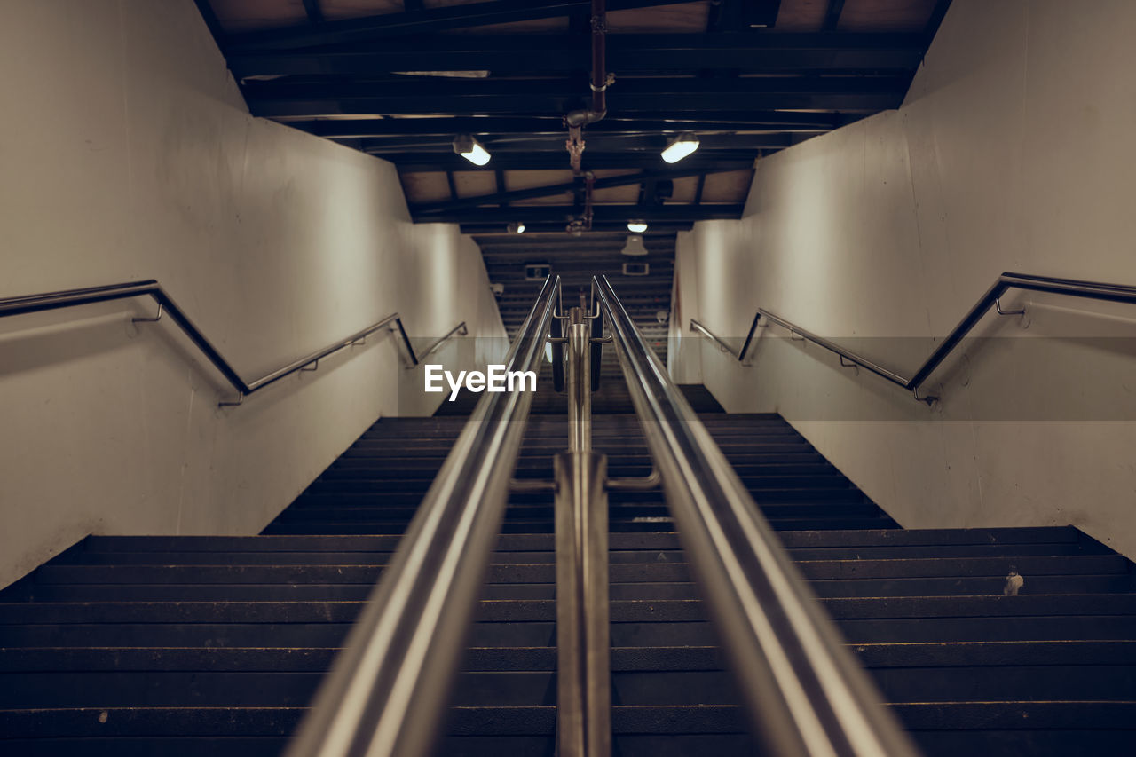 Low angle view of escalator at subway station