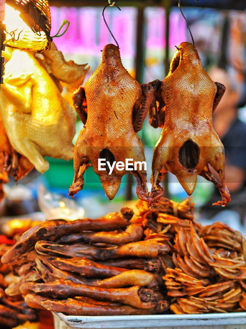 CLOSE-UP OF CRAB HANGING IN MARKET