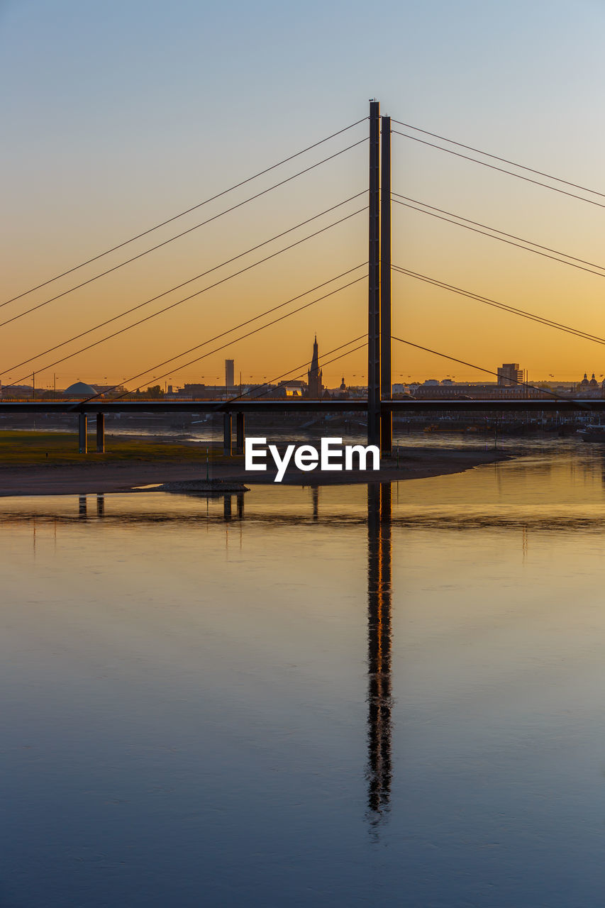 BRIDGE OVER RIVER AGAINST SKY