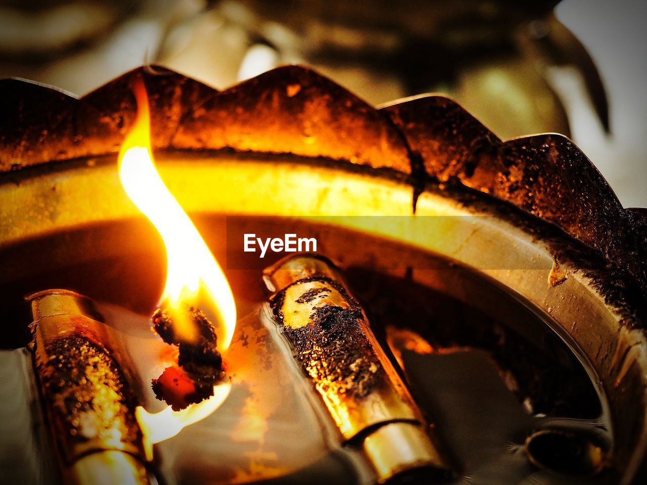 Close-up of burning diya