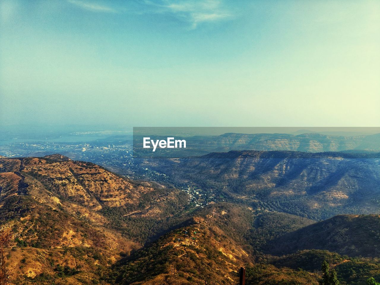 environment, scenics - nature, landscape, sky, nature, beauty in nature, mountain, tranquility, cloud, tranquil scene, land, mountain range, no people, travel destinations, non-urban scene, outdoors, aerial view, high angle view, travel, day, horizon, idyllic, rock, wilderness, morning, tourism, remote, fog, plateau, horizon over land