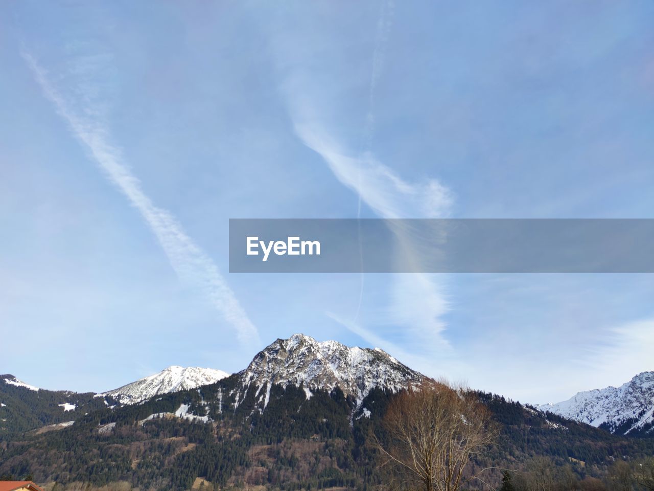 Low angle view of mountain range against sky