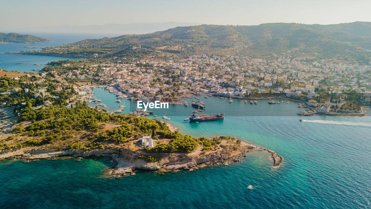 Aerial view of town situated by sea