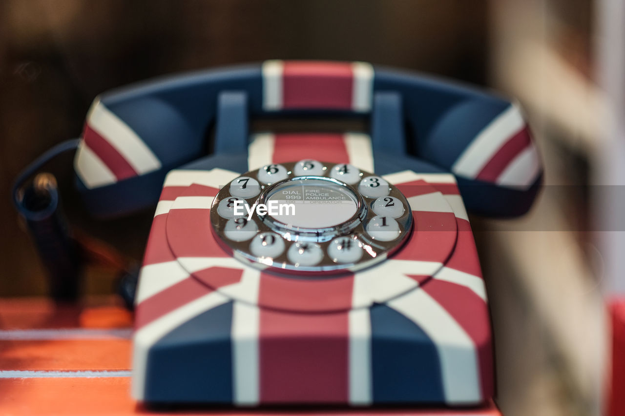 Close-up of british retro telephone on table