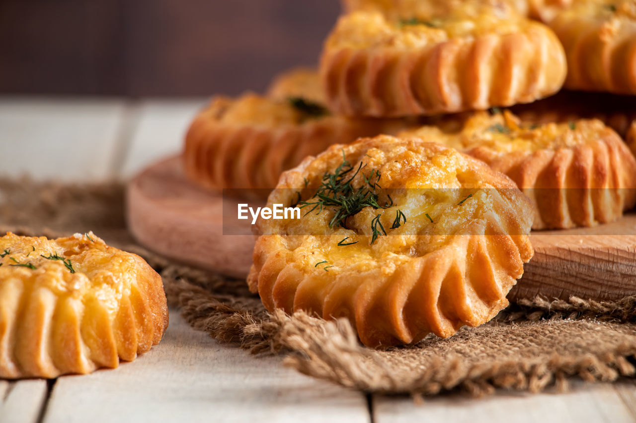 food and drink, food, freshness, baked, dessert, produce, sweet food, no people, pastry, healthy eating, sweet, wood, dish, indoors, table, close-up, selective focus, cake, celebration, baked pastry item, still life, wellbeing, snack, fruit, studio shot, rustic, bread