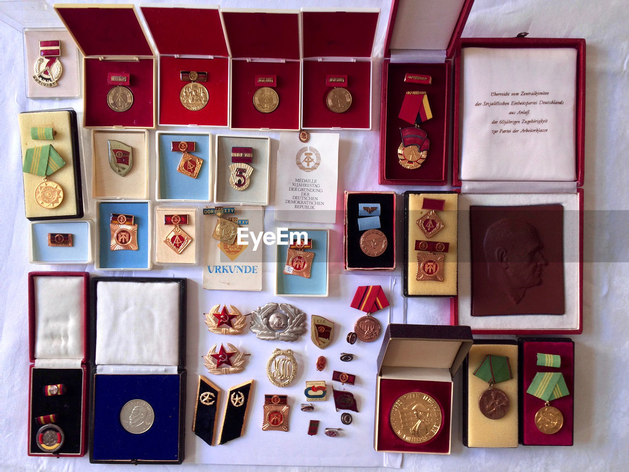 Directly above shot of badges and medals on table