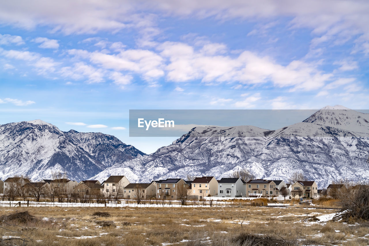 SNOWCAPPED MOUNTAINS AGAINST SKY