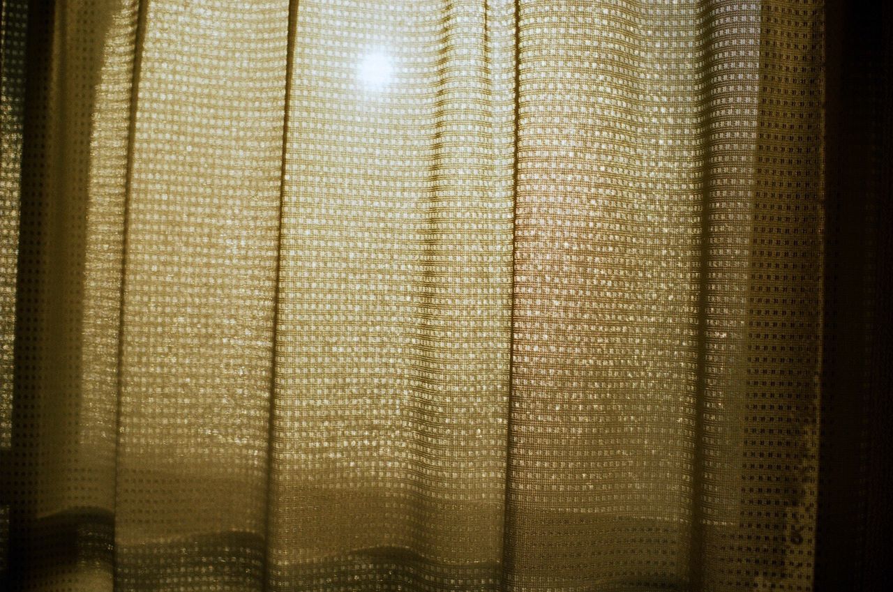 CLOSE-UP OF CURTAIN