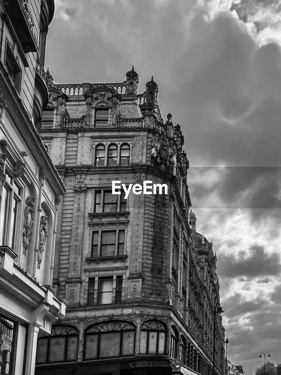 Low angle view of historic building against cloudy sky