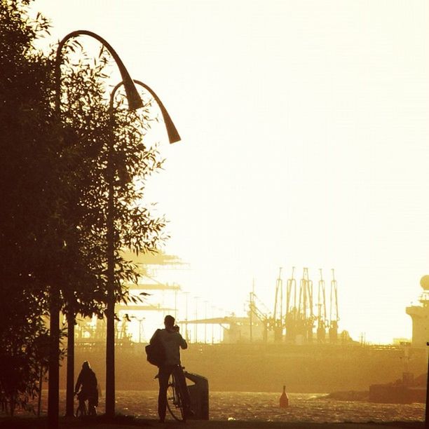 VIEW OF PEOPLE AT SUNSET