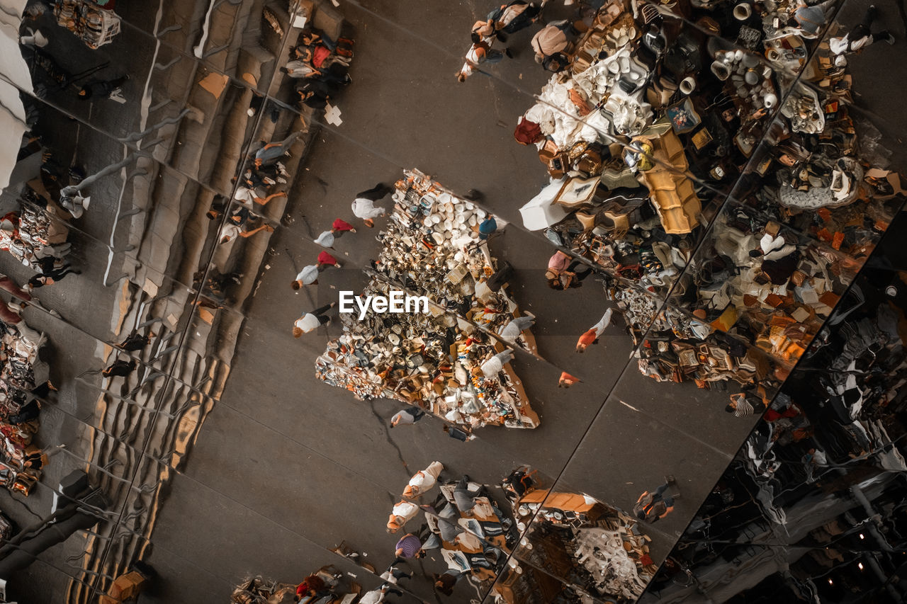 High angle view of people at market in city