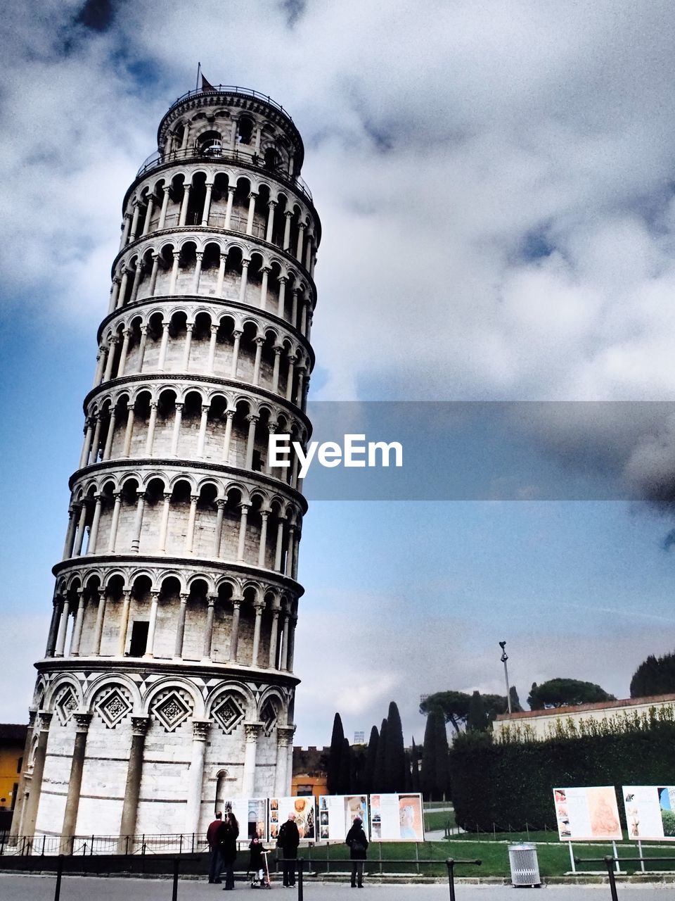 Tourists outside leaning tower of pisa