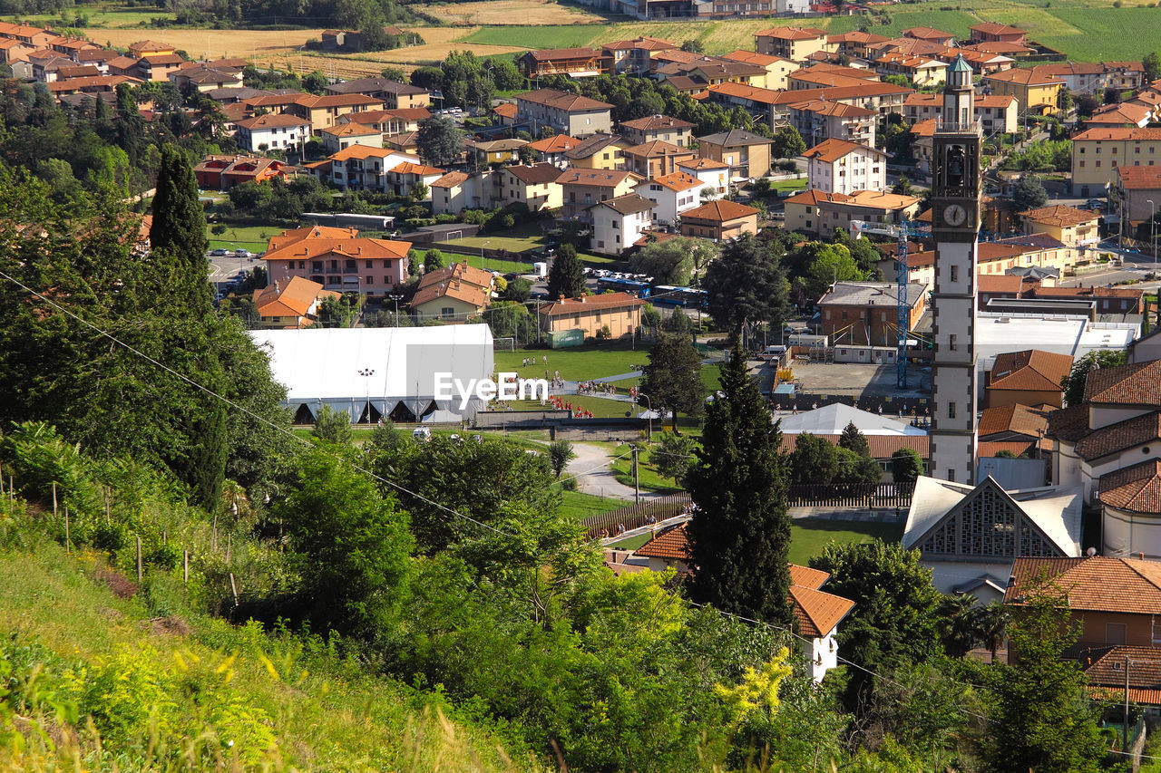 High angle view of townscape and trees in town