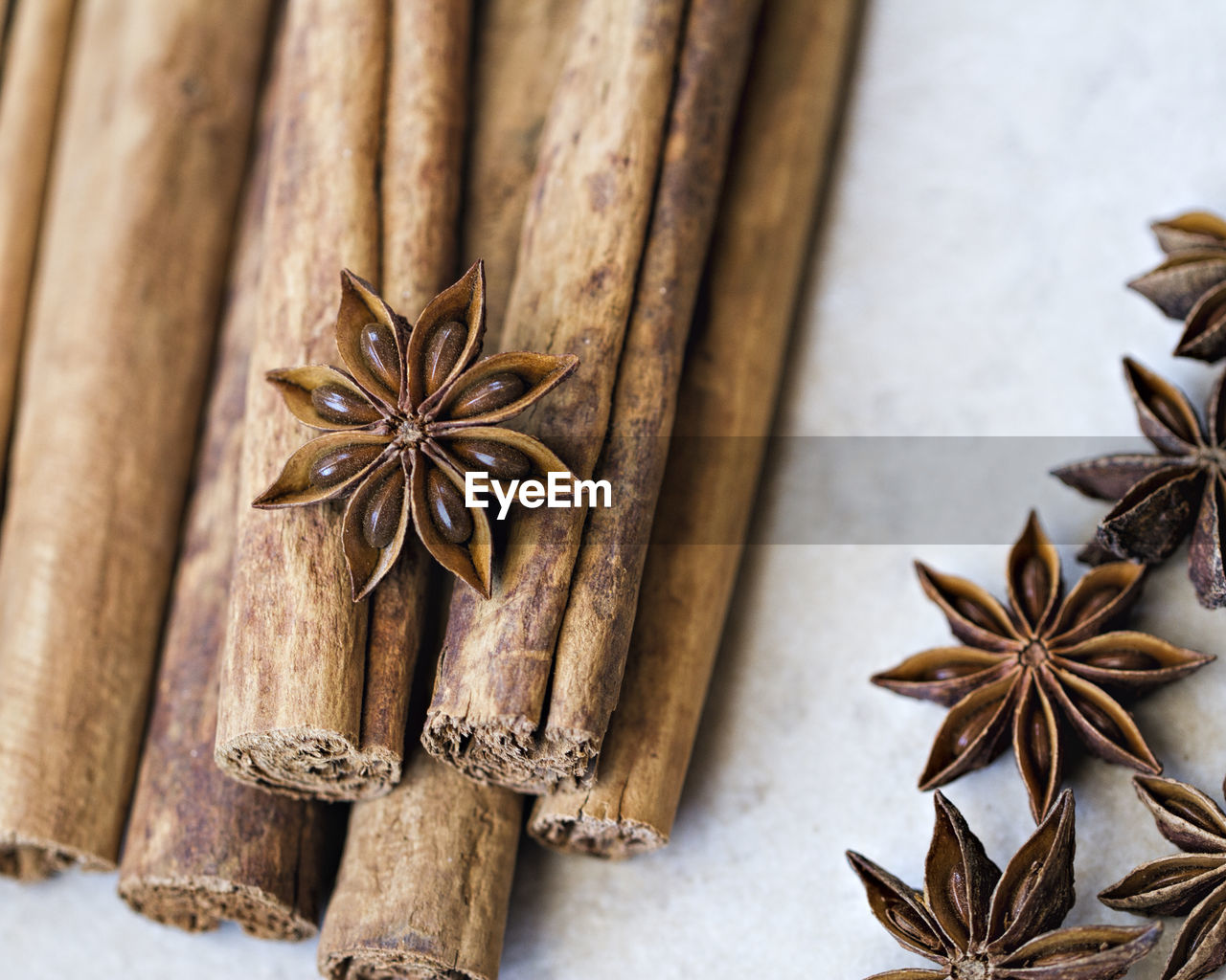 Close-up of cinnamons and star anise on table