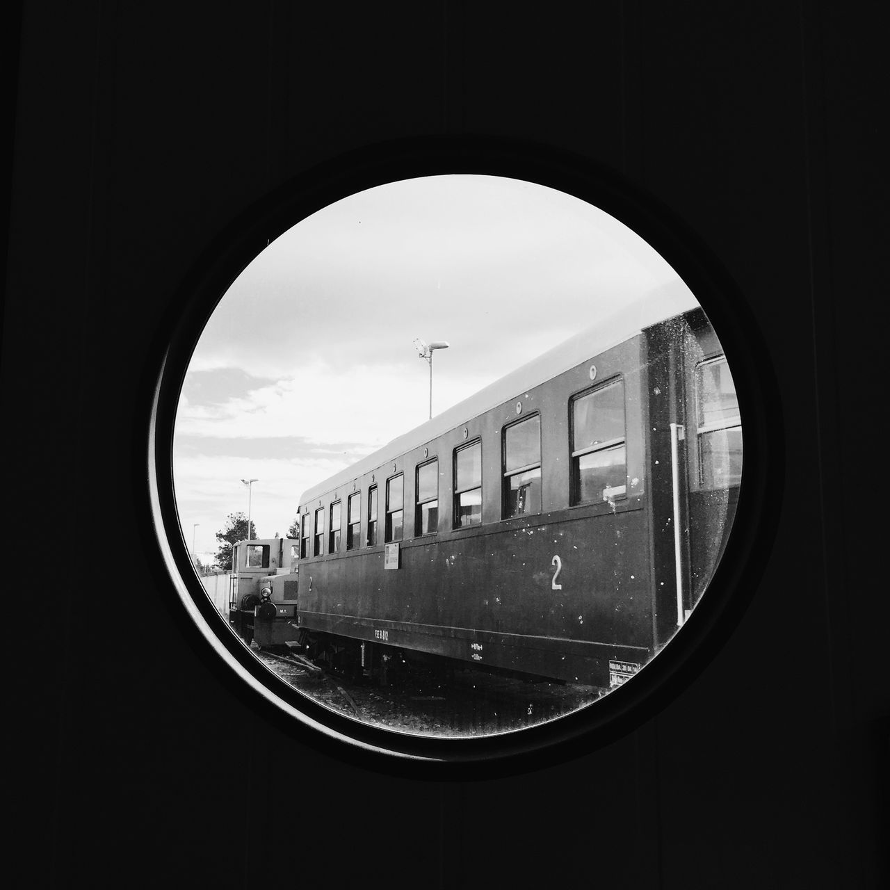 View of train through circular window