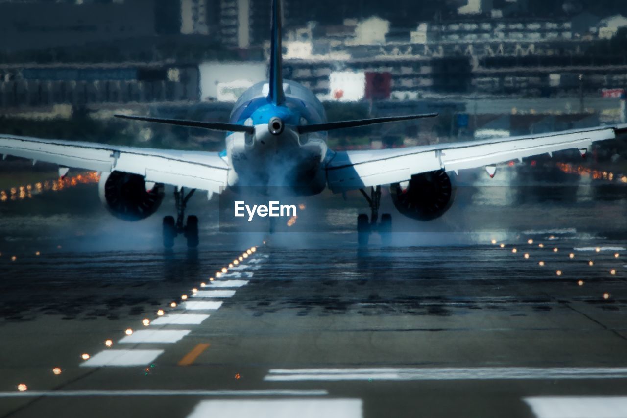 View of airplane at airport runway