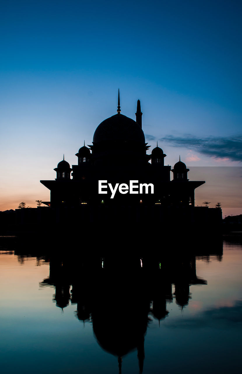 SILHOUETTE OF CHURCH AT SUNSET