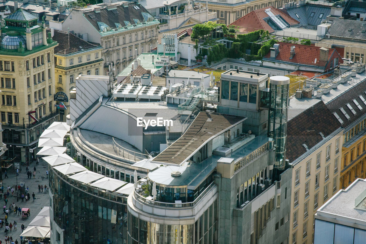 HIGH ANGLE VIEW OF MODERN BUILDINGS IN CITY