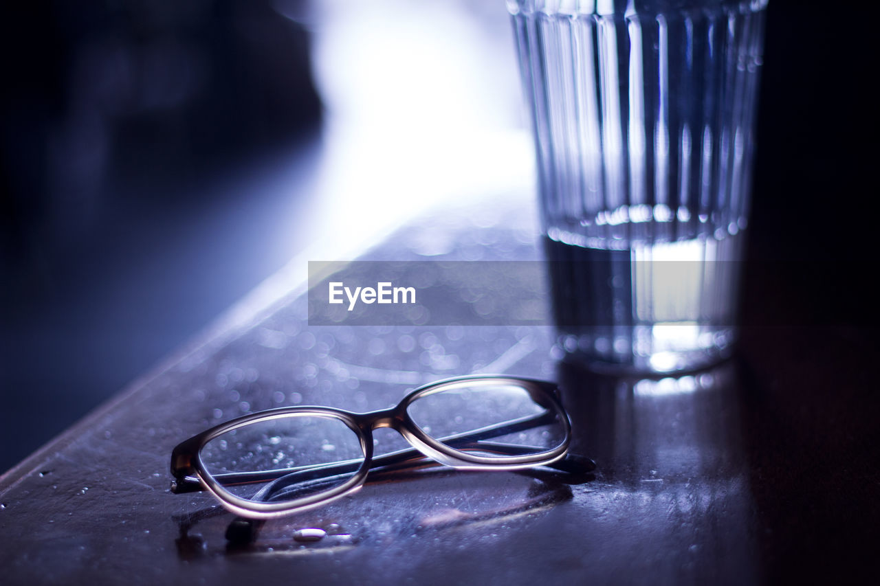 Close-up of eyeglasses on table