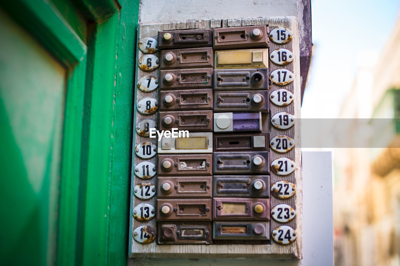 Close-up of intercom on wall