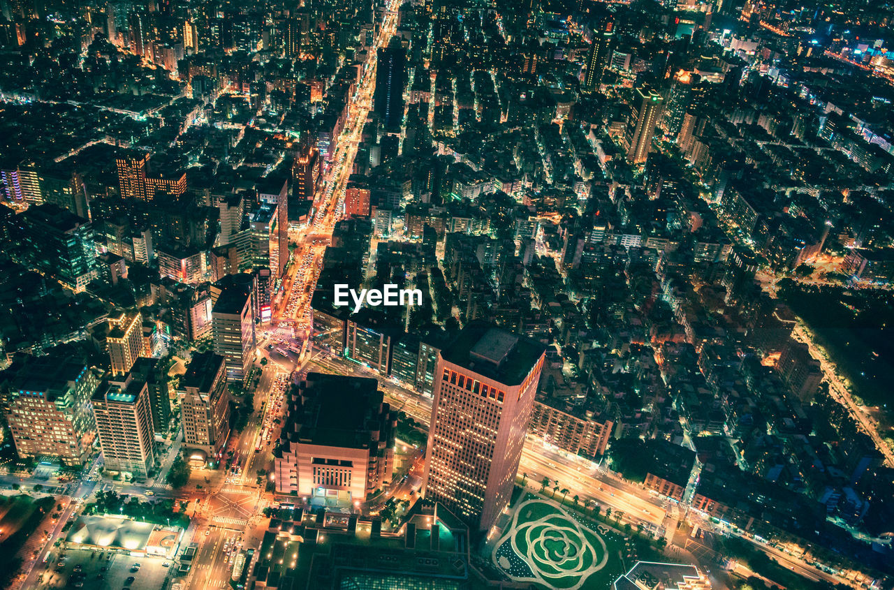 High angle view of city buildings at night