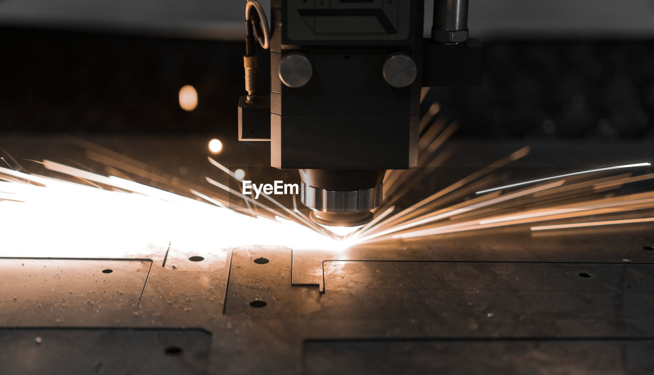 Close-up of fiber laser cutting metal